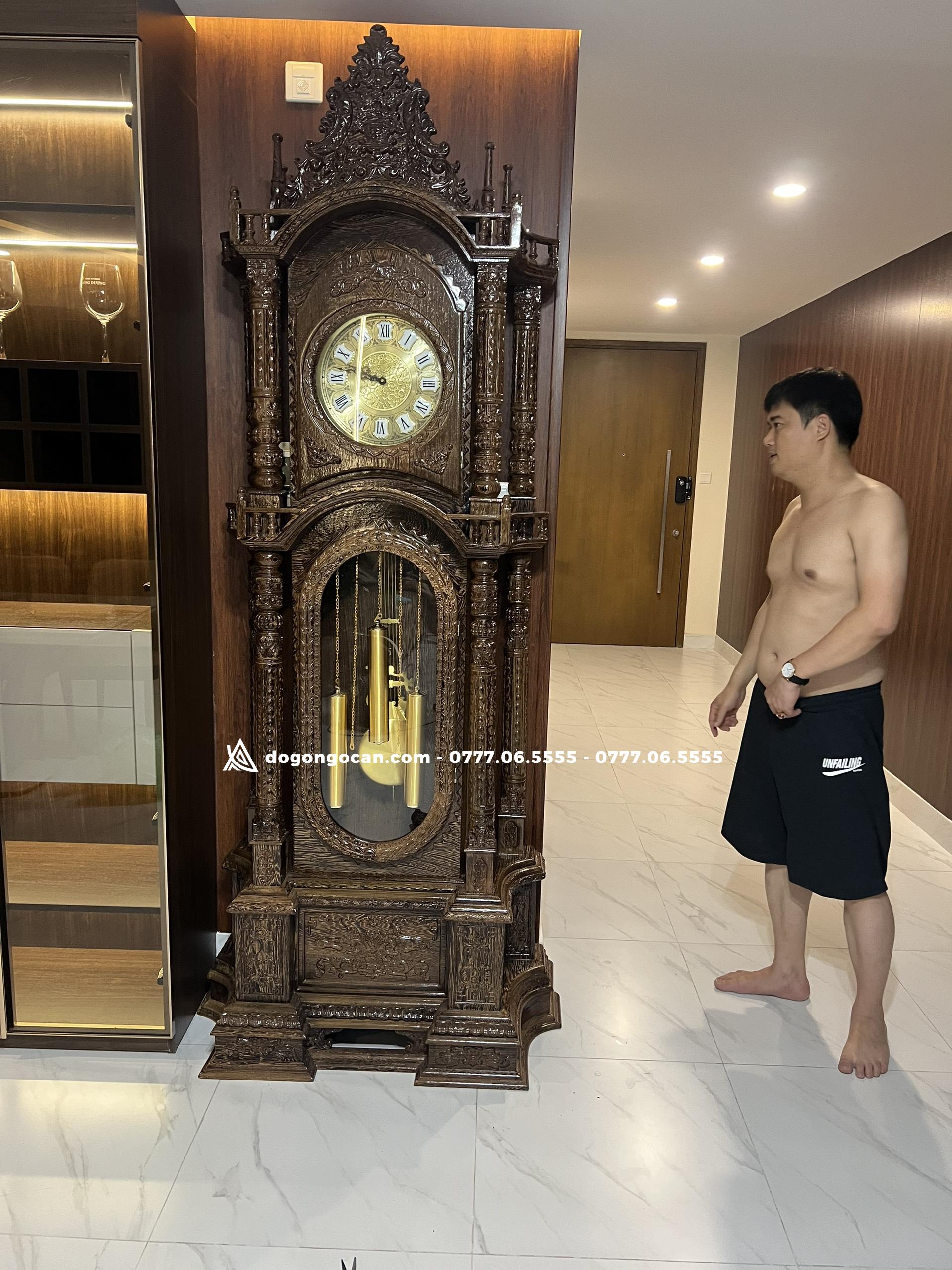 Đồng Hồ Tứ Trụ gỗ mun đuôi công cao 2m3 máy sunny hàn quốc 1 Cây Đồng Hồ Tứ Trụ Gỗ Mun Đuôi Công Nam Phi